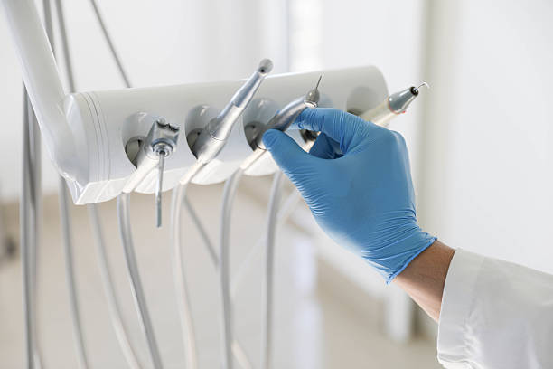 Professional Emergency Dentist technician working in Sallisaw, OK